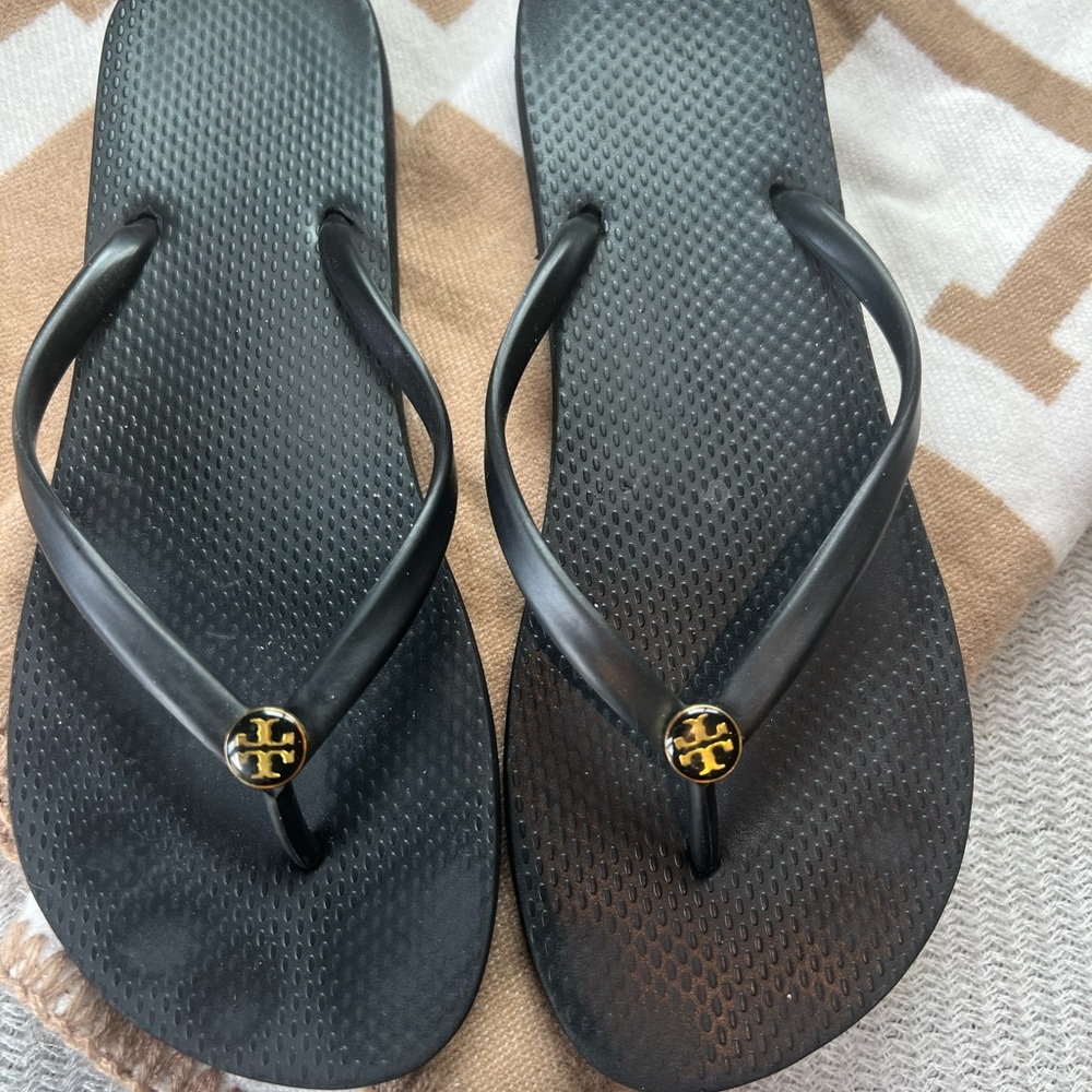 Tory burch flip flops black and gold size 7.5